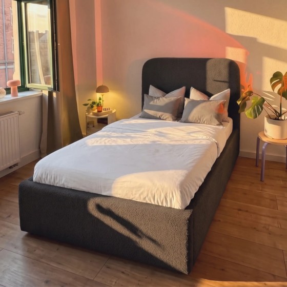 Łóżko tapicerowane z pojemnikiem na pościel SOMI 90x200 - czarny